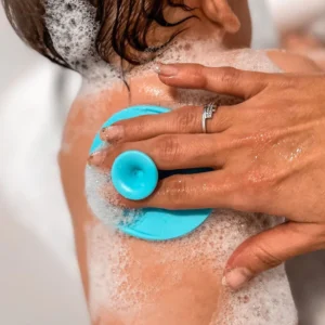 Coppia di spazzole in silicone azzurre Frida Baby con ventosa per il bagnetto del neonato
